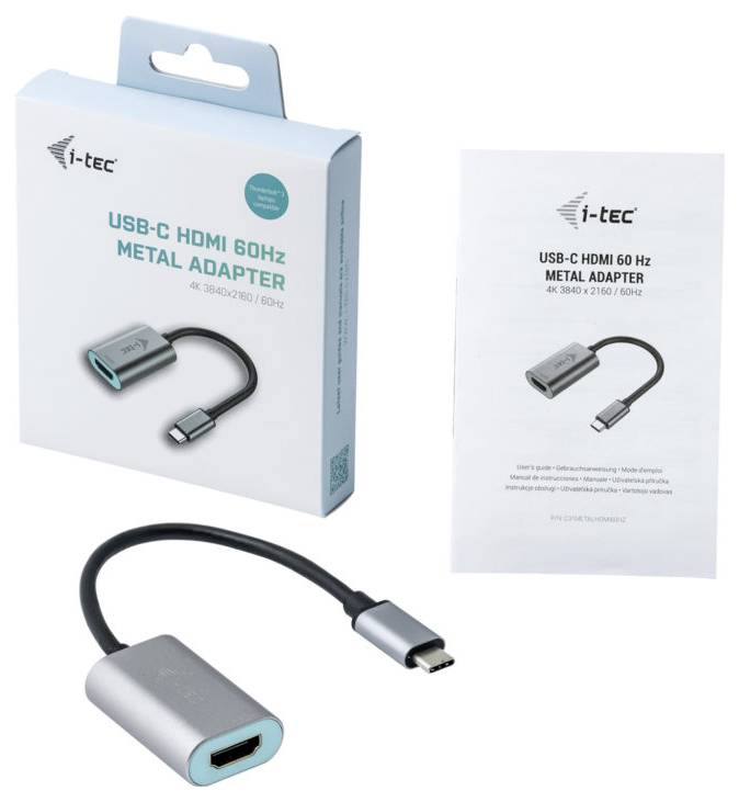 USB-C na HDMI 60 Hz metalni adapter od i-tec-a. Slika prikazuje adapter, ambalažu i upute. Adapter za prijenos videosignala na HDMI uređaje.