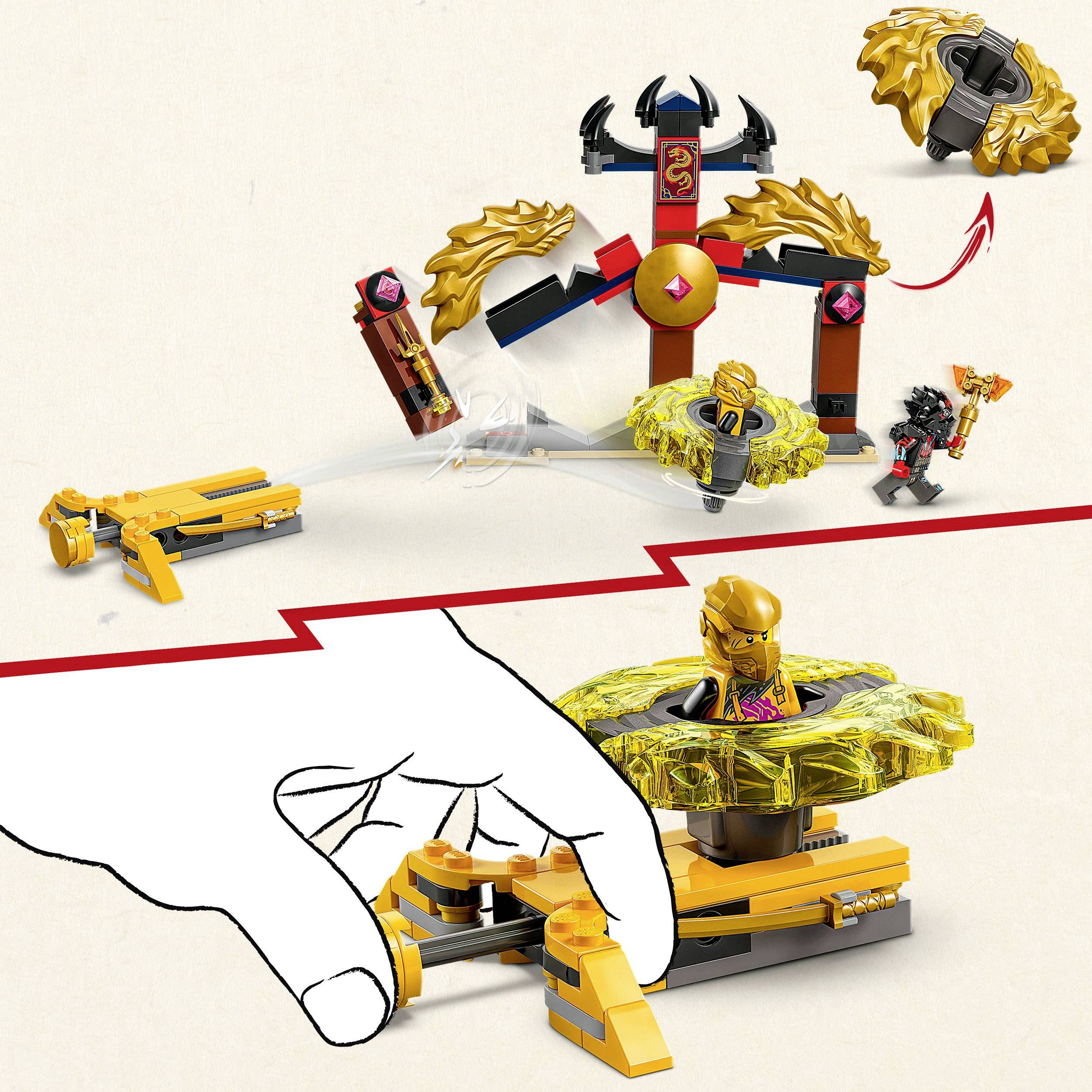 LEGO set: Ninja figura s rotirajućim elementom i zlatnim krilima napada tamnog ratnika. Ruka pritišće polugu za aktivaciju.