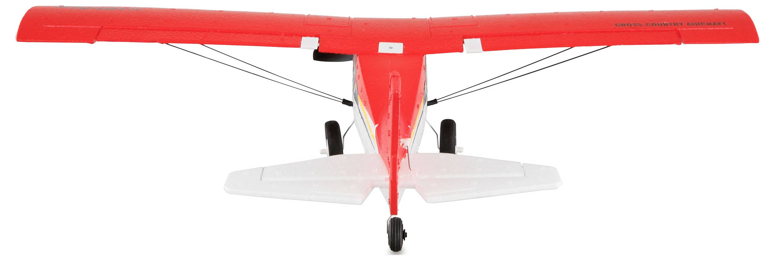 Crveni i bijeli modelarski avion snimljen straga, s vidljivim krilima i podvozjem.