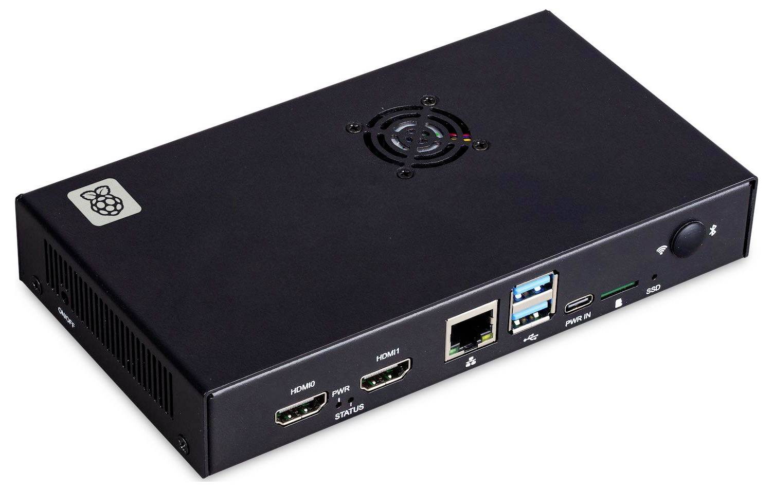 Crni elektronički uređaj s nekoliko priključaka, uključujući dva HDMI-a, dva USB-a, Ethernet i priključak za napajanje, s ventilatorom i Raspberry logotipom.