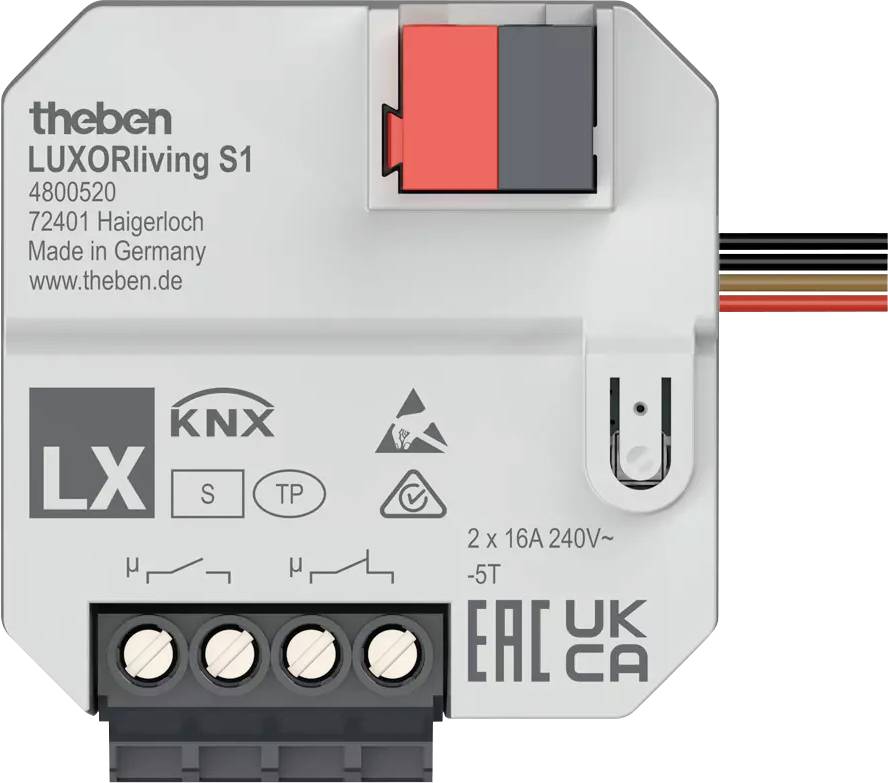 Slika prikazuje električni upravljački modul s oznakom 'theben LUXORliving S1'. Sadrži nekoliko priključaka i simbola.