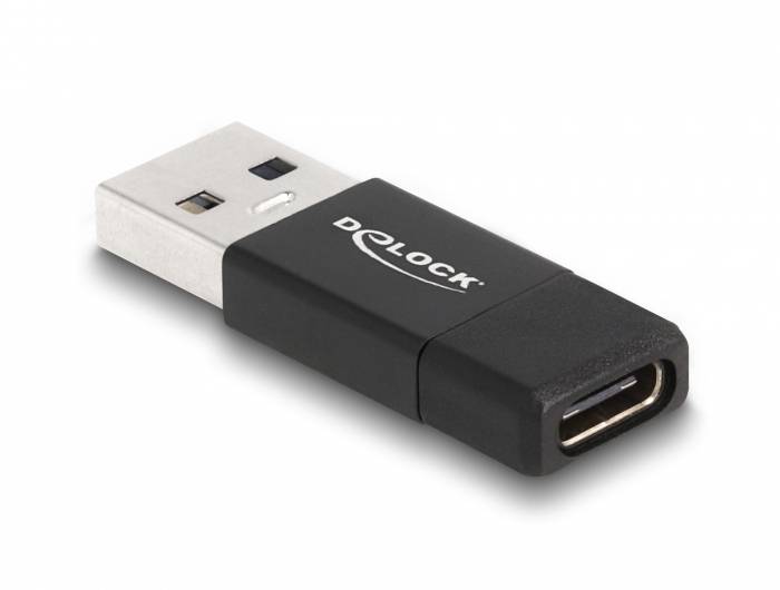 USB adapter marke Delock sa srebrnim utikačem i crućim kućištem, pogodan za spajanje USB i USB-C priključaka.