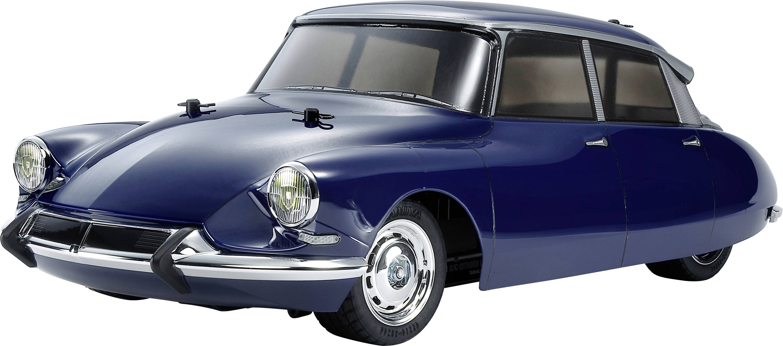 Plavi modelni automobil u retro stilu koji podsjeća na oblik oldtimera. Ima aerodinamičku karoseriju i okrugle farove.