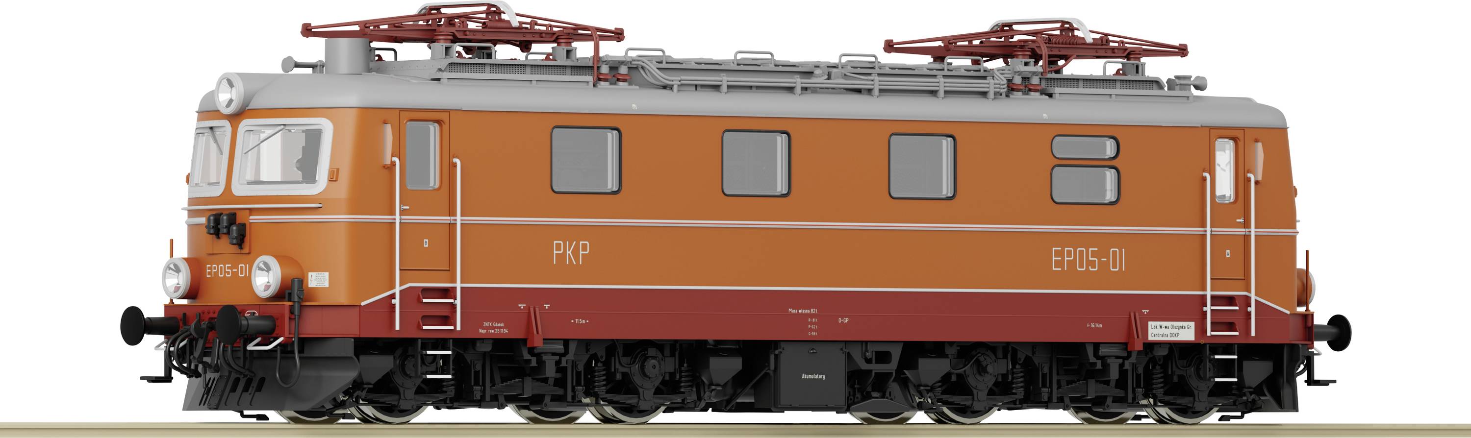 Narančasta dvooosovinska električna lokomotiva na tračnicama. Sadrži oznaku 'PKP EP05-01'.