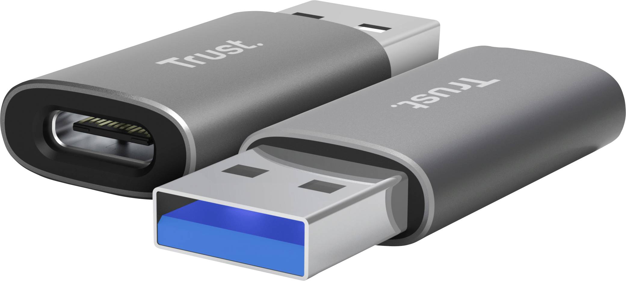 USB-C i USB-A štapići tvrtke Trust, srebrni, položeni jedan do drugoga; oba označena logotipovima.