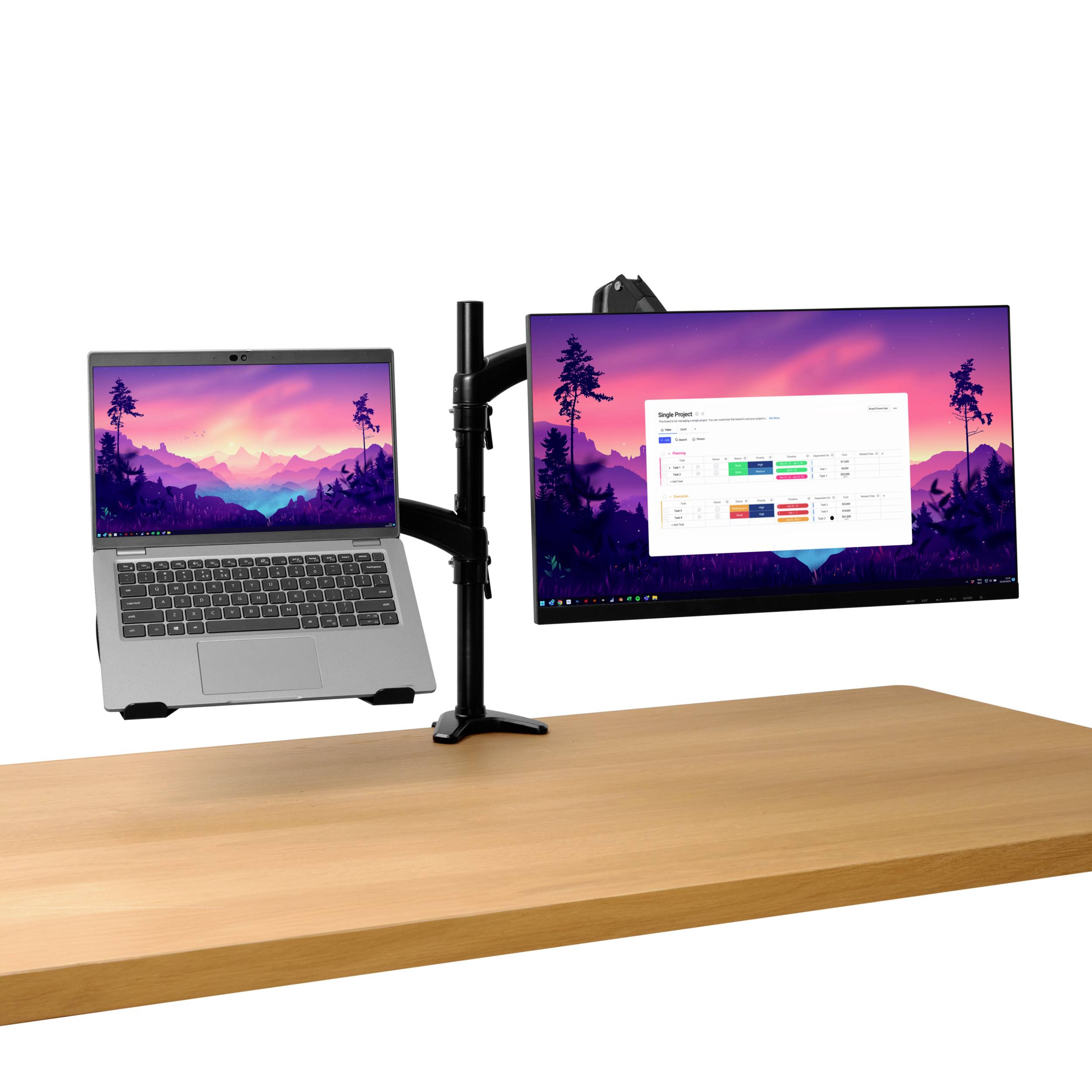 Laptop i monitor na dvostrukoj nosačkoj ruci iznad drvenog stola. Monitor prikazuje tablicu s šarenim dijagramima.