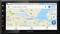 Navigacijski uređaj s Google Maps prikazuje kartu s Amsterdamom u centru. Gore se može pretraživati: 'Pokušaj benzinske pumpe, bankomate'. Vrijeme: 11:21.