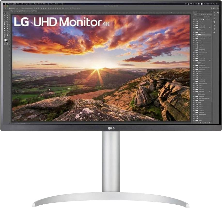 LG UHD monitor prikazuje živopisni zalazak sunca s kamenitim terenom i obojenim oblacima. Različiti alati za uređivanje vidljivi su na zaslonu.