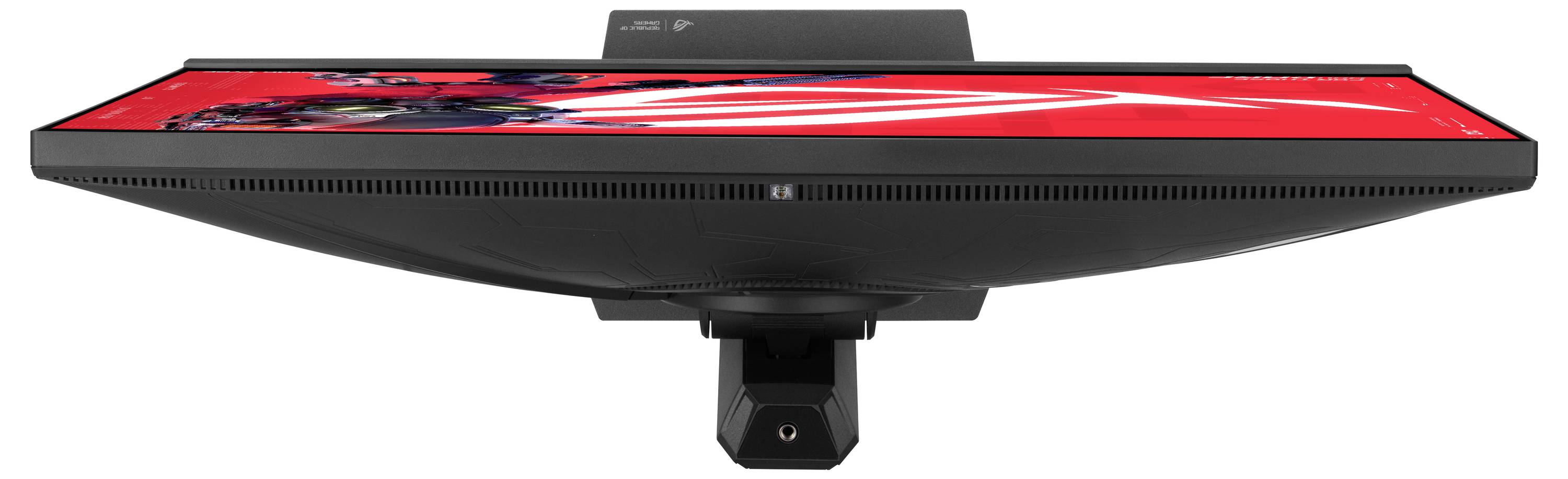 Monitorom s ravnim ekranom gledan odozgo, koji prikazuje živopisnu crvenu sliku s apstraktnom grafikom. Monitor ima tanki dizajn okvira.