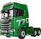 Zeleni Scania kamion s naljepnicom '770' na boku, prikazan sprijeda s dijelom kabine. Kamion ima kromne detalje i dodatna svjetla na vrhu.