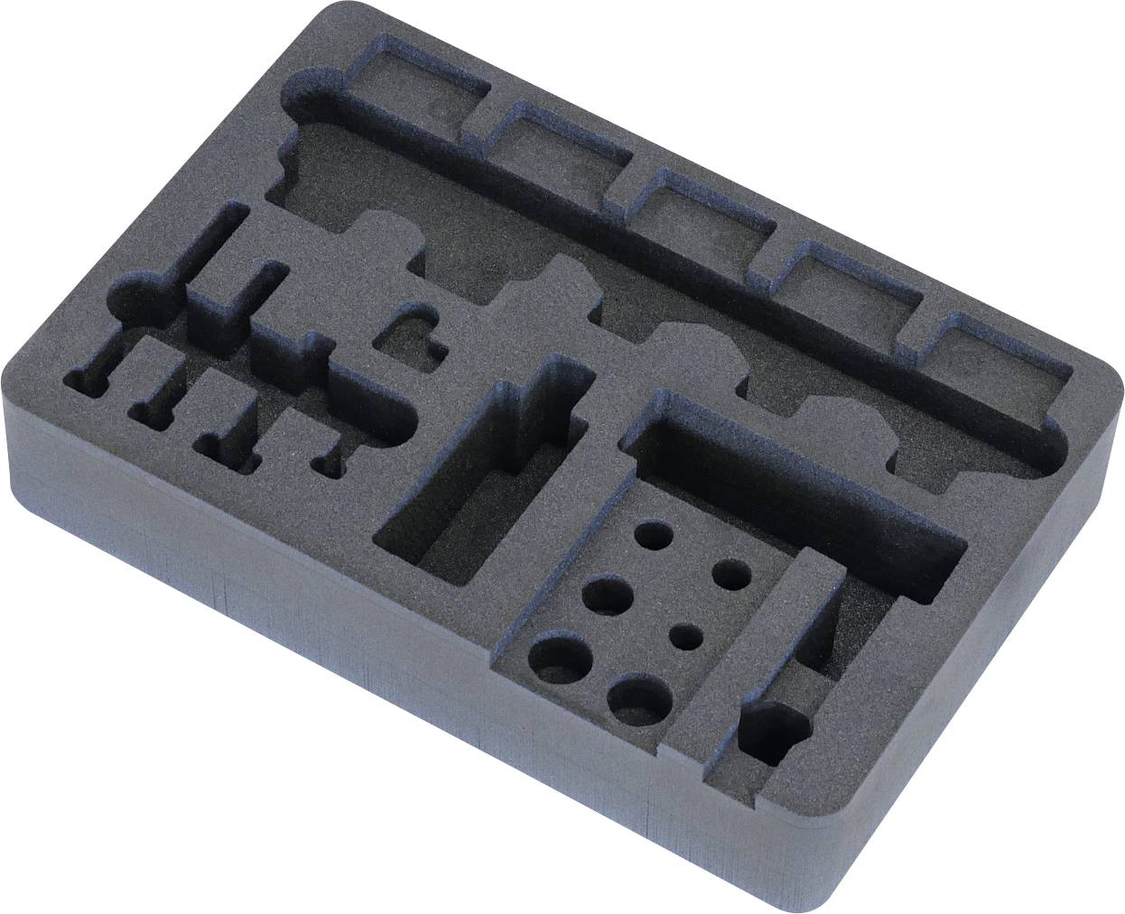 Crna pjenasta umetak s različitim izrezima dizajniran za sigurno održavanje više alata ili komponenti.