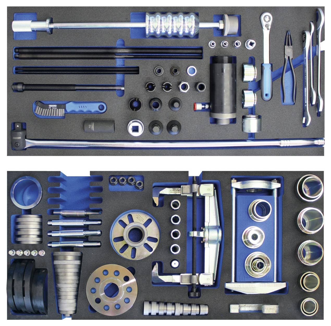 Komplet mehaničkog alata uredno organiziran u pjenastoj poslici, uključujući ključeve, nasadne čahure, produžne šipke, klešta i komplet hidrauličke prešule.