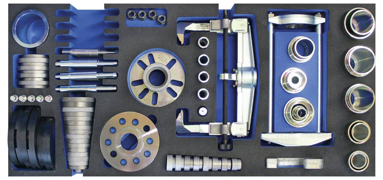 Skup izolirane alata koji uključuje ključeve, pincete i rezač, svi s crvenim i žutim ručkama, dizajnirani za sigurnu rad s elektricitetom.