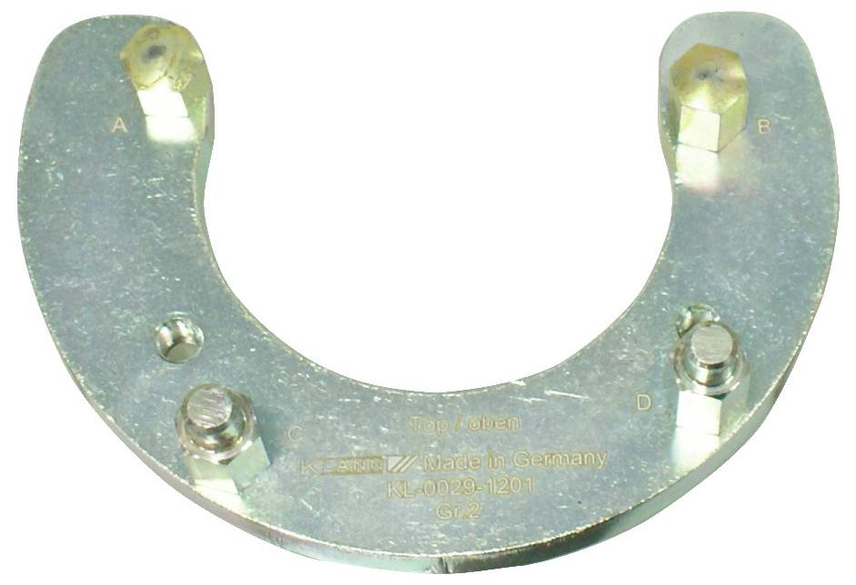 Metalni alat sa četiri označene pozicije: A, B, C i D. Upisano: 'Made in Germany, RL40029-1201'. Primarno se koristi za namjene poravnanja.'