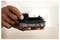 Tehnički crtež uređaja s prednjim i bočnim pogledima. Dimenzije su navedene: širina 44,4 mm, visina 82,6 mm, dubina 59,6 mm.
