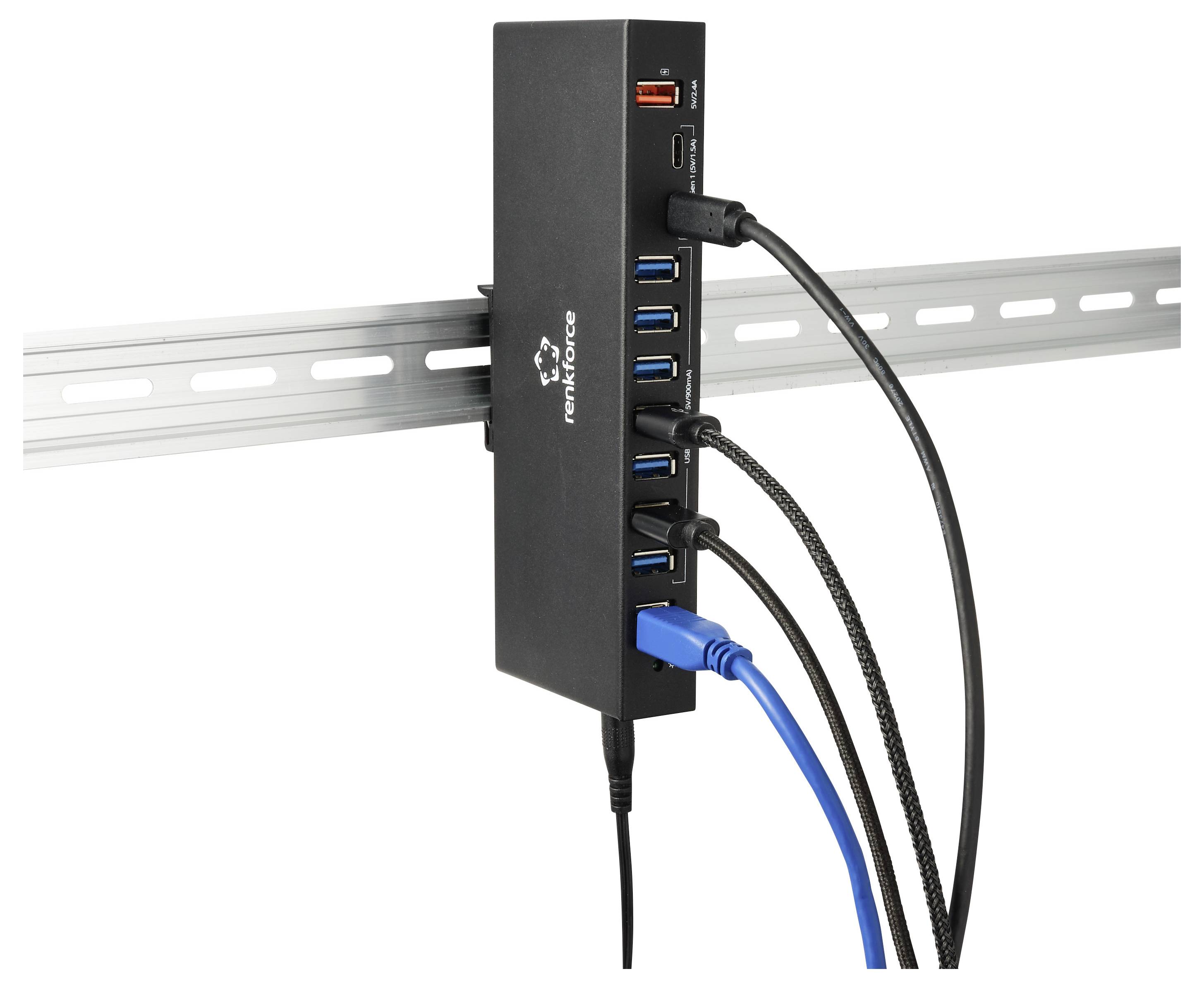 Crni multiport USB hub montiran na metalnu tračnicu, s nekoliko USB kabela uključenih i jedan kabel koji visi dolje.