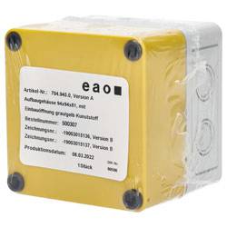 'Žuti i sivi plastični elektronički uređaj s naljepnicom na kojoj se prikazuje broj stavke 704.545.0, verzija A, i datum proizvodnje 06.01.2022.'