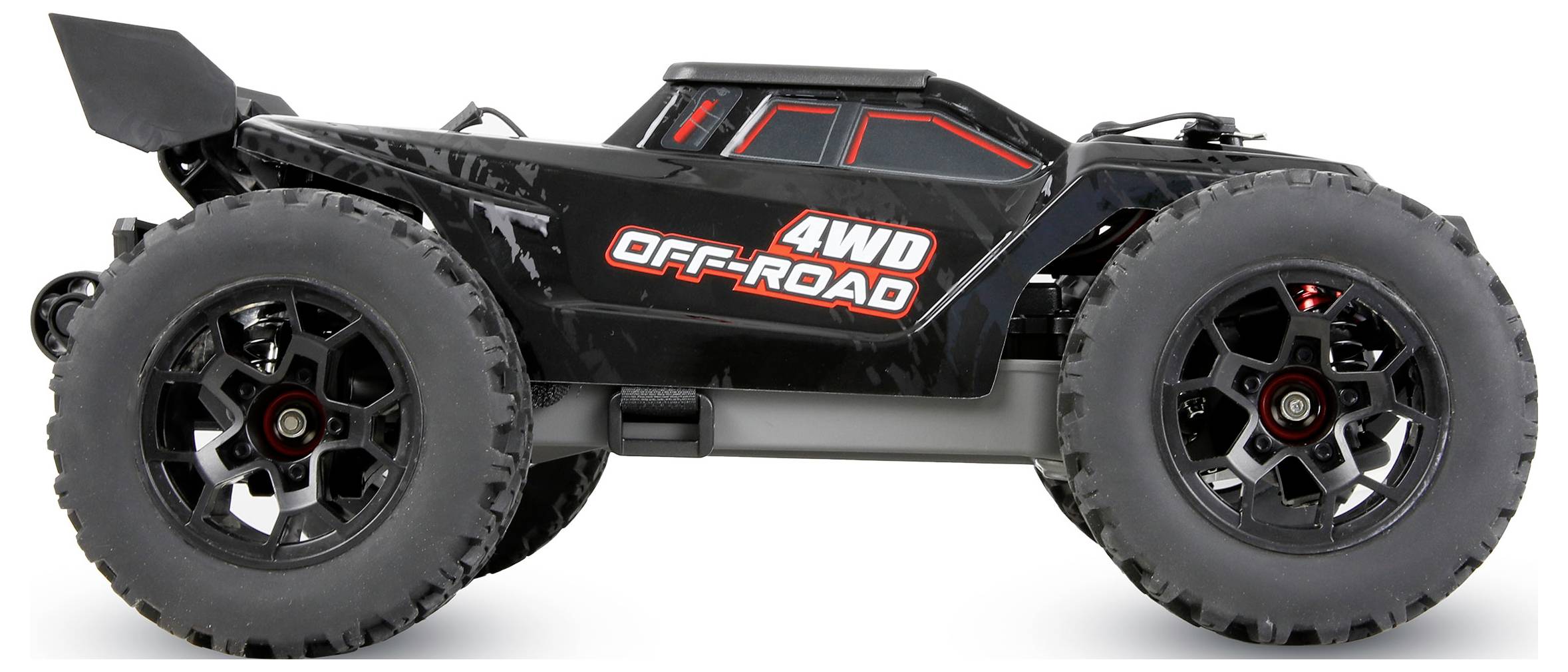 Crni 4WD terenski RC kamion prikazan u bočnom pogledu s preuveličanim gumama i crvenim akcentima na detaljima.
