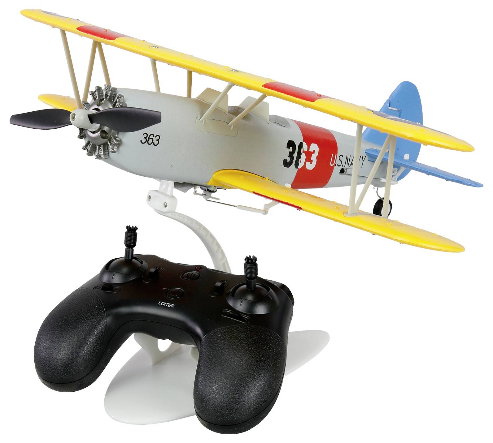 Igračka daljinski upravljana dvokrilka na stalku iznad crnog gamepad kontrolera, prikazana na bijeloj pozadini.