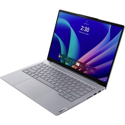 Srebrni Lenovo laptop otvoren pod kutom, prikazujući Windows radnu površinu s satom koji pokazuje 14:30 na ekranu.