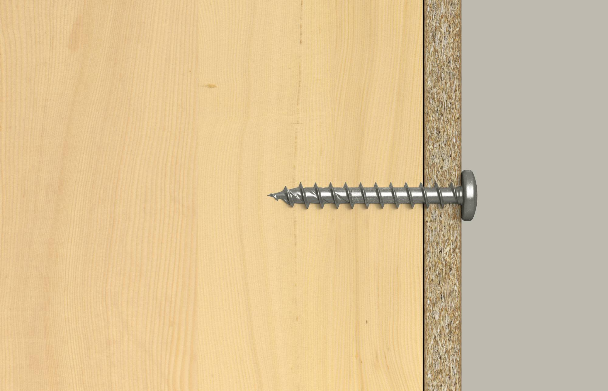 Detaljni prikaz vijka koji je horizontalno ubit u drvenu dasku, s vrhom koji se proteže u drvo i glavom blizu desnog ruba.