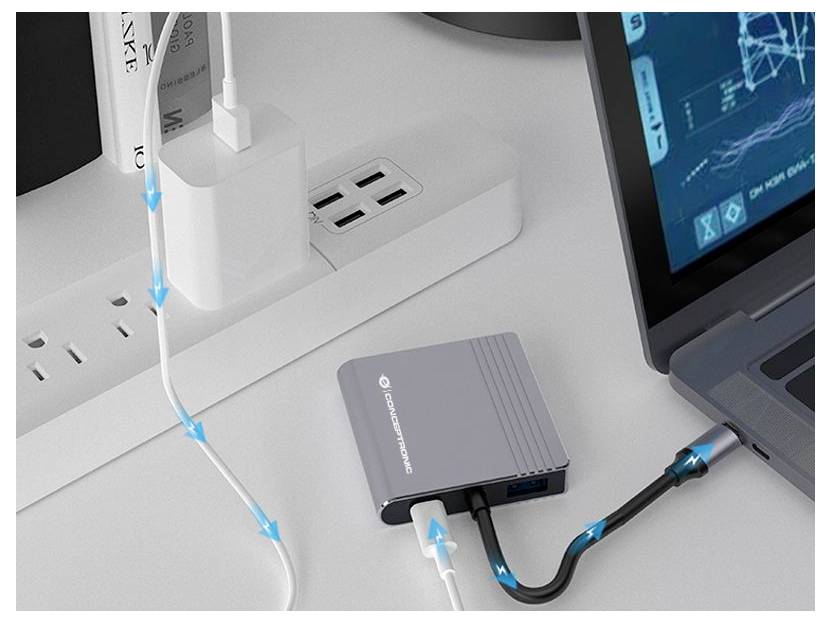 Snimak bliskim kadriranjem lijevog ruba prijenosnog računala na kojem se vide tipkovnica, rešetka zvučnika te USB-C i USB-A priključci.
