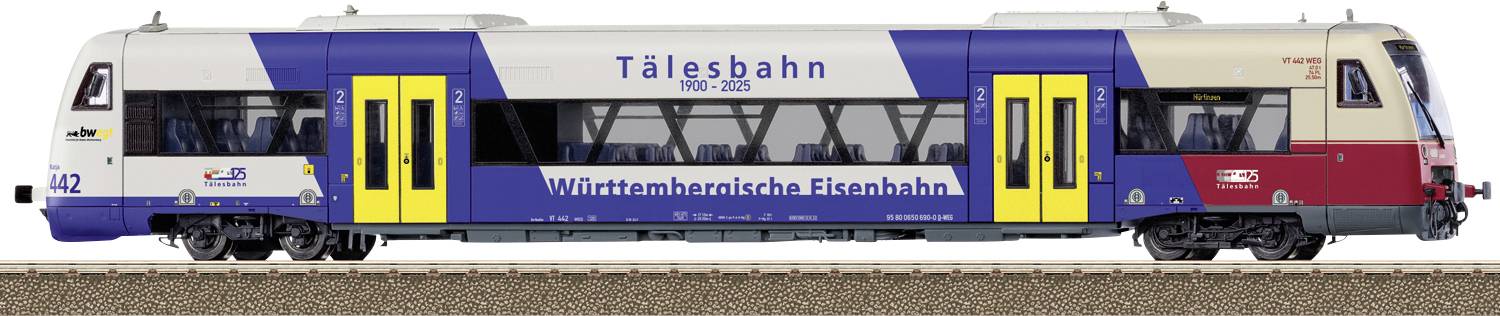 Bočni pogled na plavi i bijeli putni vlak sa žutim vratima, označen kao Tålesbahn i Württembergische Eisenbahn, broj 142.