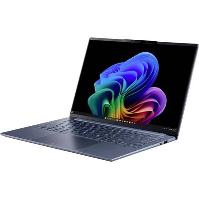 Tanka plava prijenosna računala prikazana otvorena pod kutom, s šarenim apstraktnim Windows-stilskim pozadinom na zaslonu.