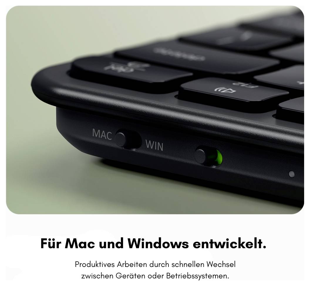 Snimak iz blizine tipkovnice sa Mac/Win preklopnikom, pokazujući da je dizajnirana za Mac i Windows; natpis kaže 'Razvijeno za Mac i Windows.'