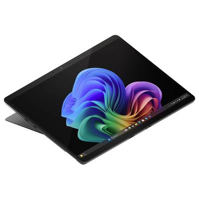 Prijenosno računalo u načinu rada tableta koje prikazuje šarenu spiralnu pozadinu Windowsa 11 na crnom ekranu.
