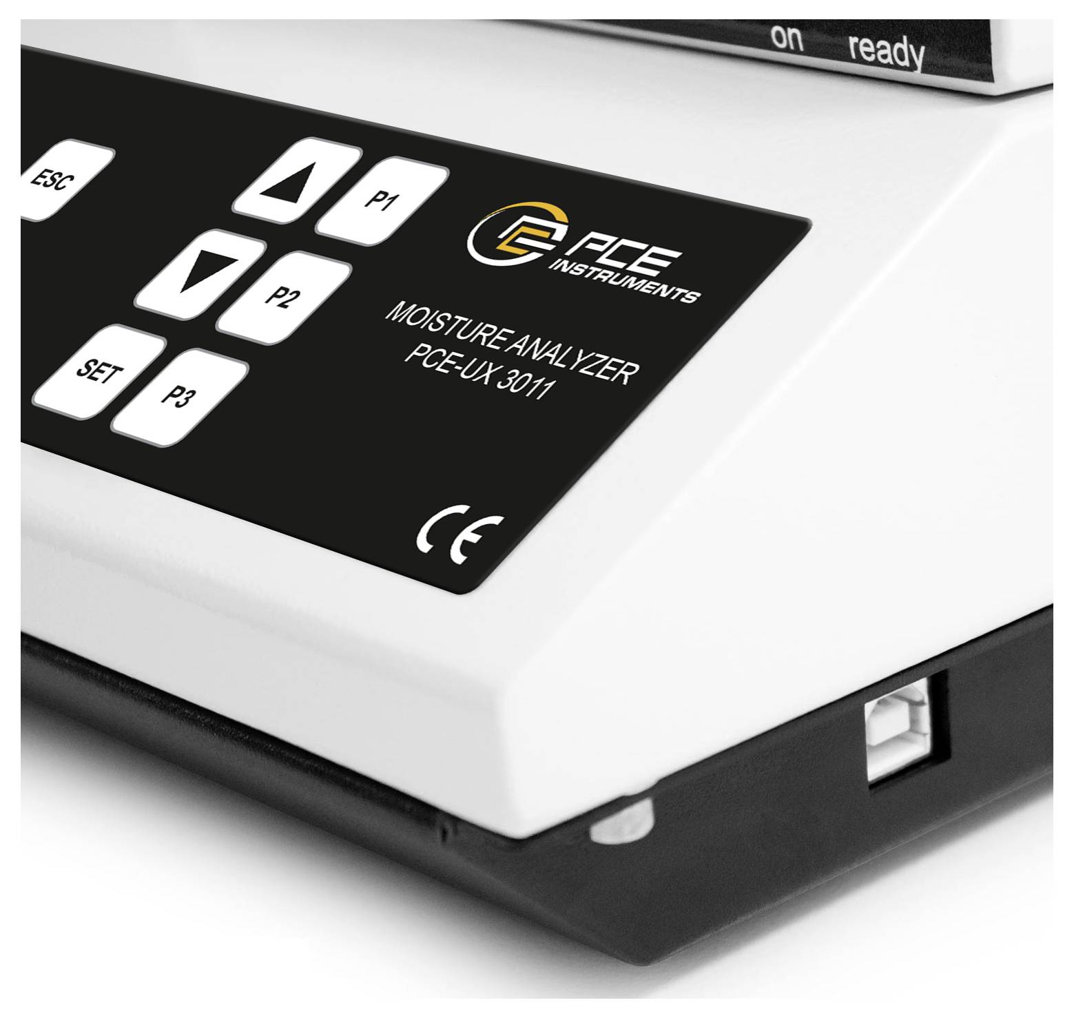 PCE Instruments analizator vlage s kontrolnim gumbima i panelom za prikaz, označen kao 'MOISTURE ANALYZER PCE-WX 3011'.
