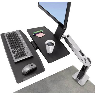 Ergonomski radni stol s monitorskim nosačem, crnom tipkovnicom, mišem, bilježnicom i šalicom kave.