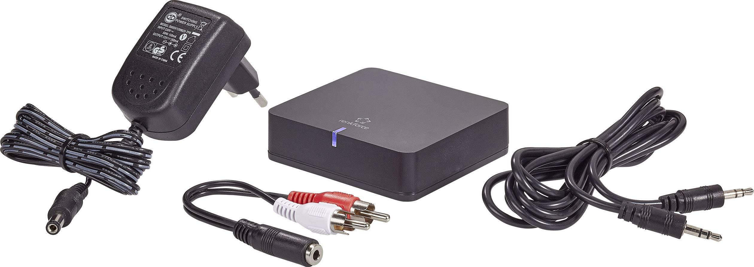 Napajanje, RCA audio kabel i crni elektronički uređaj s LED indikatorom na bijeloj pozadini.
