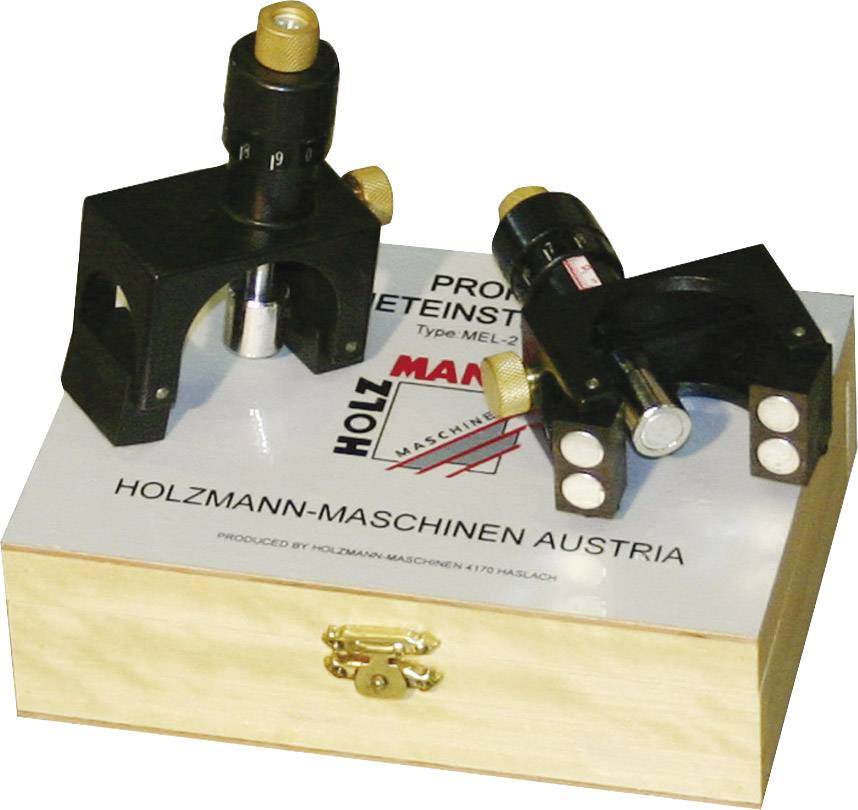 'Mjerni alati na drvenom sanduku s natpisom Holzmann-Maschinen Austria. Dva crna precizna instrumenta sa skalama i regulacijskim gumbima.'