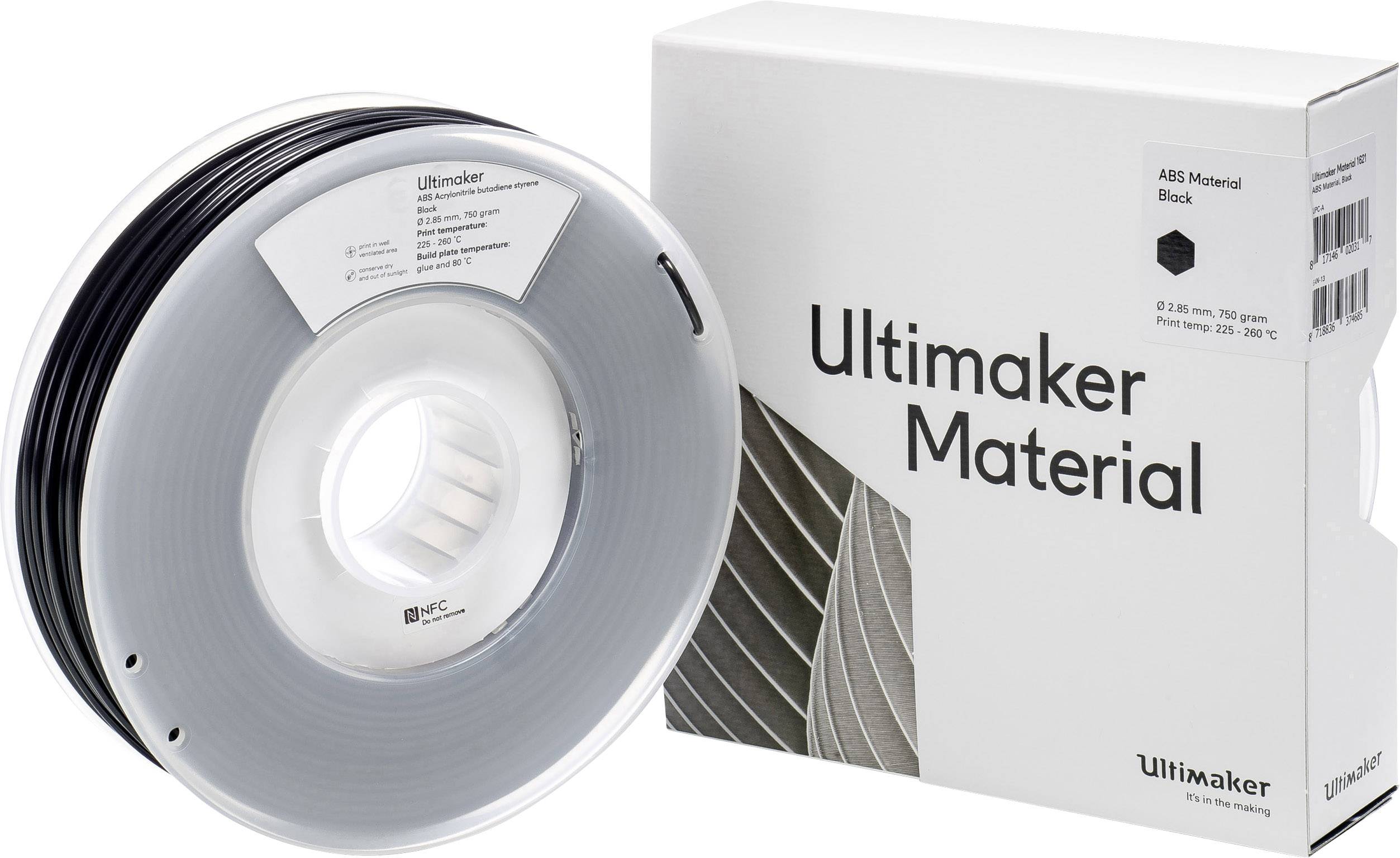 Špula crnog ABS filamenta pokraj ambalaže na kojoj piše 'Ultimaker Material'. Filament se koristi za 3D printanje.