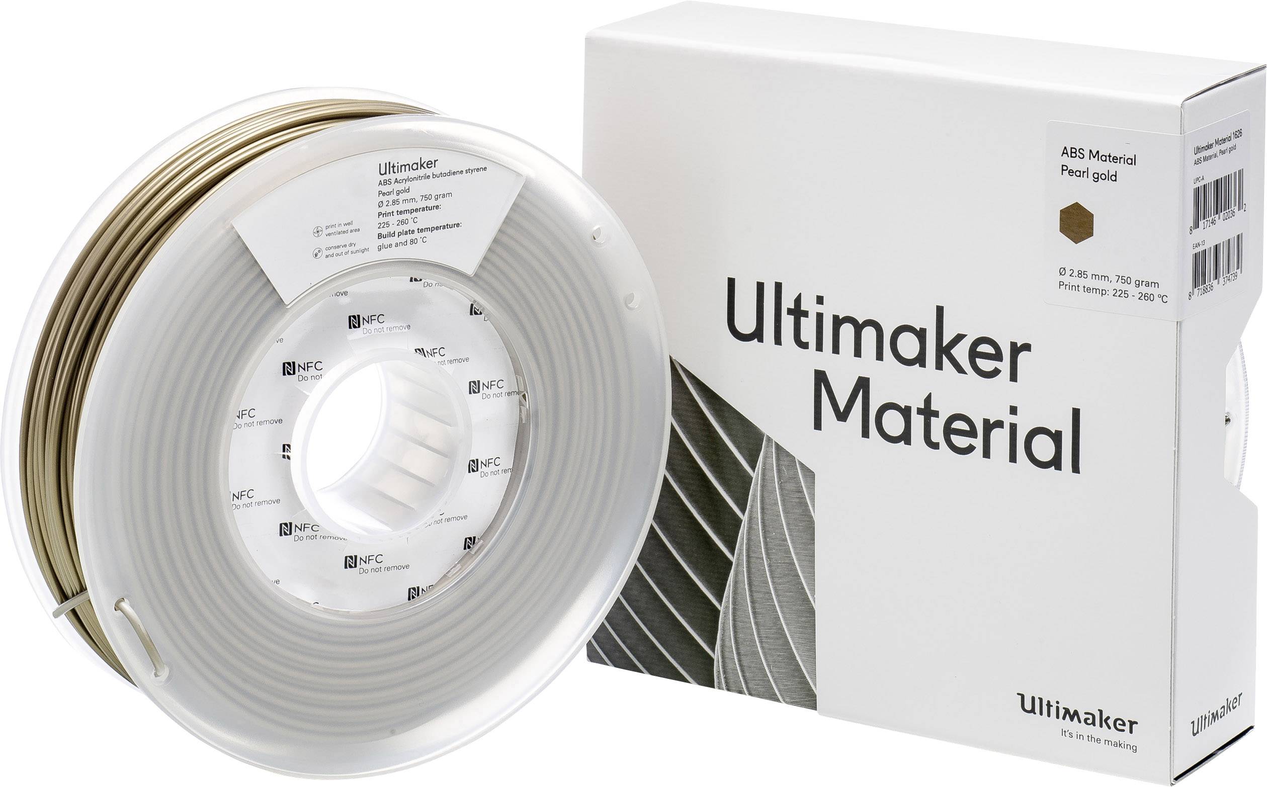 Rolica zlatnog ABS 3D-print materijala pored ambalaže s natpisom "Ultimaker Material".