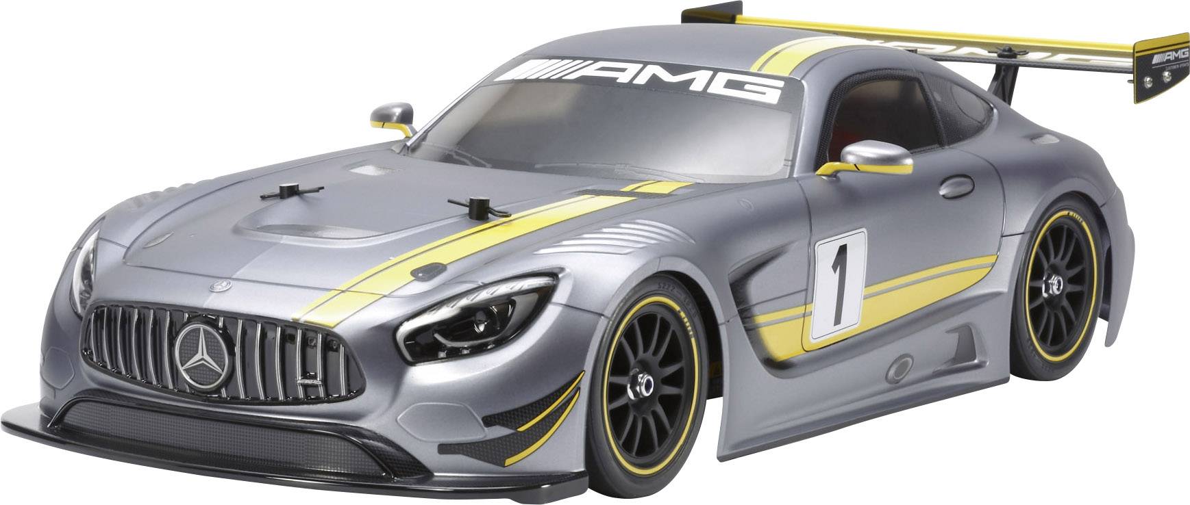 Srebrni model trkaćeg automobila s AMG logotipom, žutim prugama i brojem 1 na vratima. Aerodinamičan dizajn s stražnjim spoilerom.