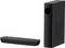 Crna soundbar s pripadajućim subwooferom. Uređaji su moderno dizajnirani i stoje jedan do drugog.