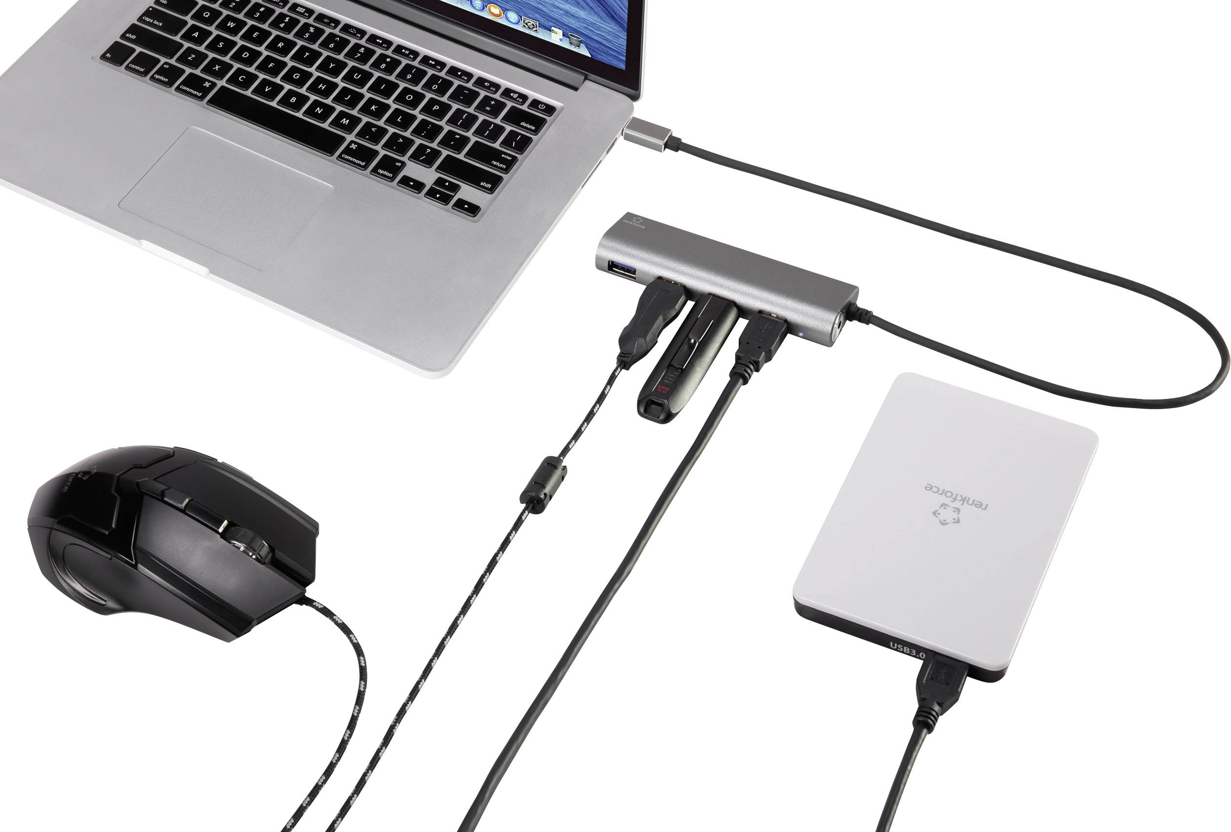 Prijenosno računalo povezano je s USB razgranjakom na koji su priključeni vanjski tvrdi disk, dva USB stick-a i računalni miš.