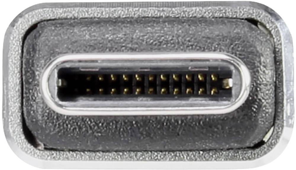 Krupni plan USB-C priključka sa srebrnim rubovima i vidljivim pinovima u sredini.