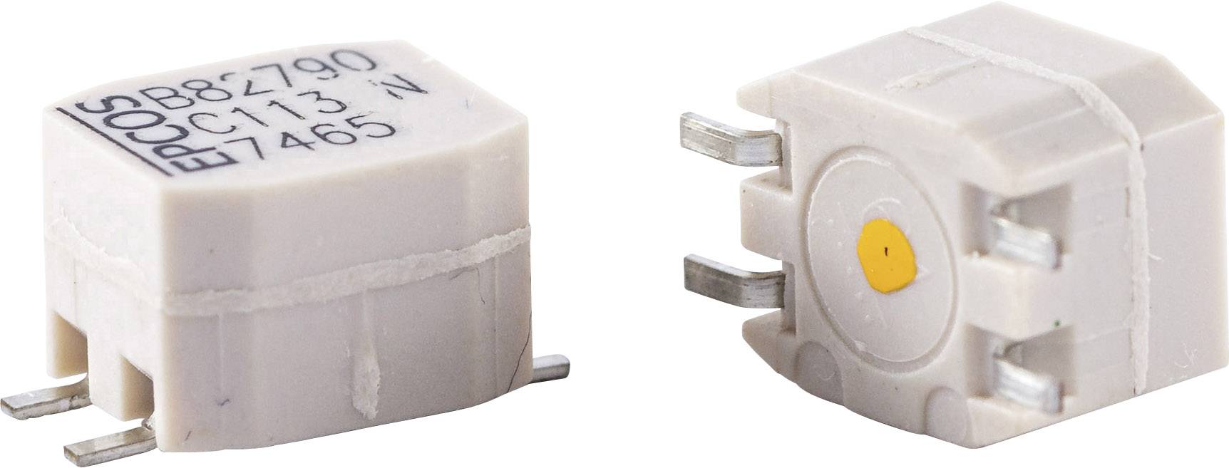 Dva bijela elektronička komponenta s metalnim umetcima i oznakama brojeva, prikazuju različite poglede na elektronički kondenzator.