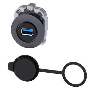 USB priključak s uklonjivim zaštitnim poklopcem, pogodan za montažu na zid. Priključak je plave boje i nalazi se u okruglom crnom okviru.