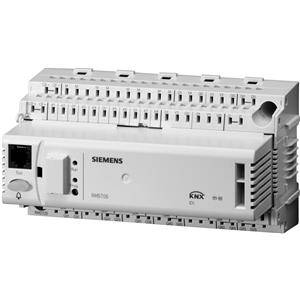 KNX sistemski modul tvrtke Siemens za automatizaciju zgrada, s priključcima za različite vrste kabela, uglavnom bijele boje.