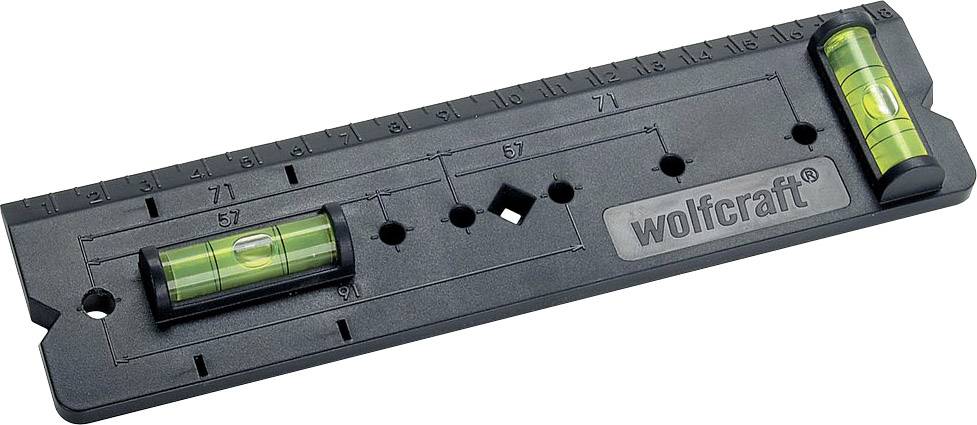 Libela marke 'wolfcraft' s dvije mjerne libele i mjernom skalom, namijenjena preciznom poravnavanju i mjerenju na ravnoj površini.
