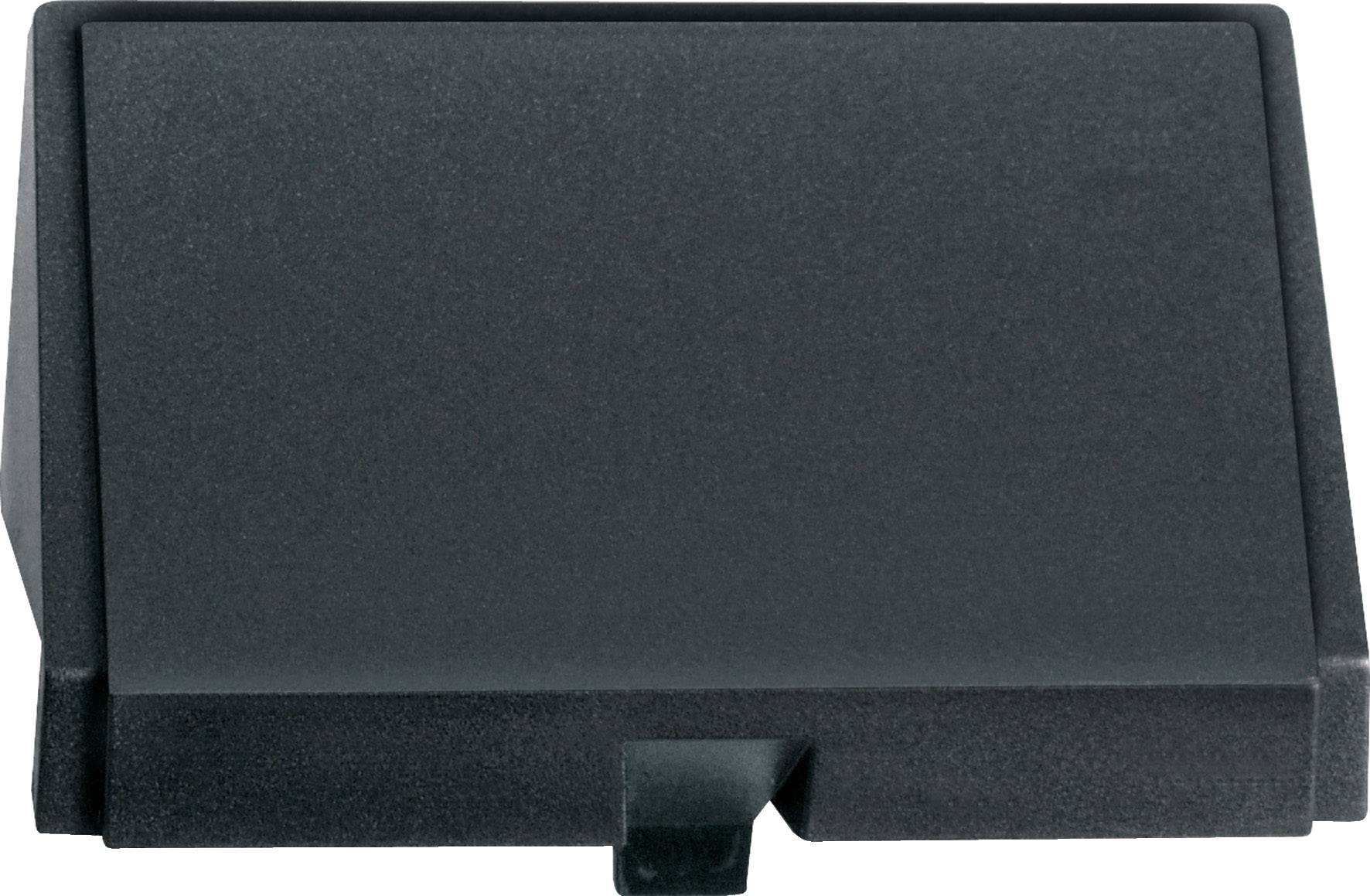Crni plastični poklopac s malim izbočenjem na donjoj strani, vjerojatno dio nekog elektroničkog uređaja ili kućišta.
