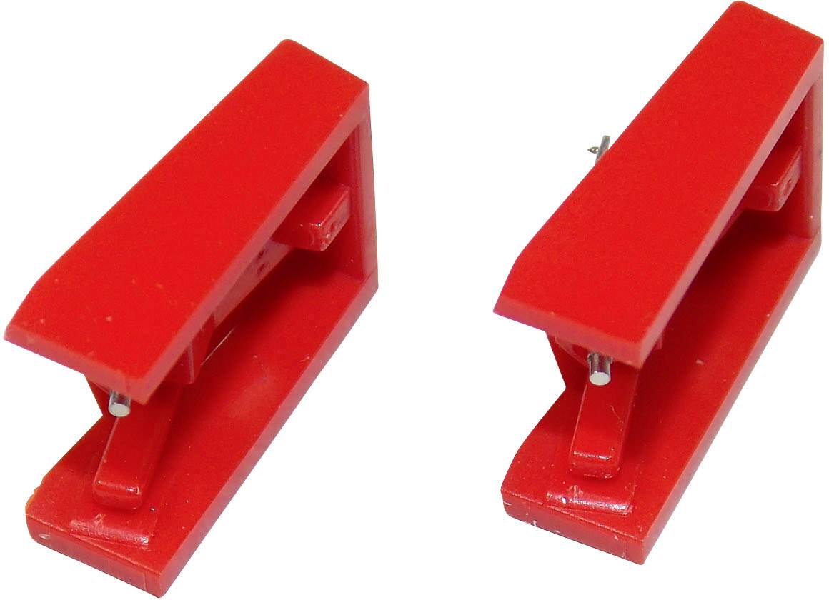 Dva crvena, otvorena registratora stoje jedan do drugog, promatrani sa strane.