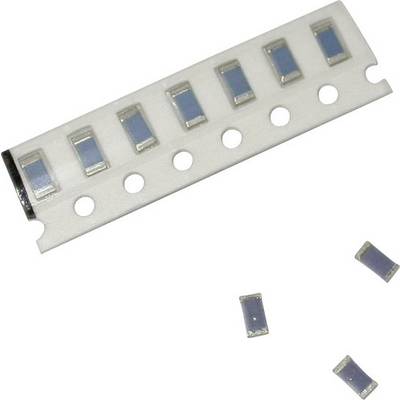 Rola s nekoliko plavih SMD otpornika i tri izdvojena otpornika pored nje. Tehnički komponenti za elektroničku montažu.