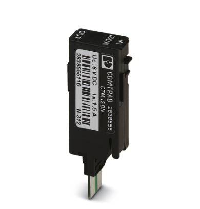 Crni elektronički komponenta s natpisom 'COMTRAB', model UC-6 VDC. Ima više priključaka i naljepnicu s tehničkim detaljima.