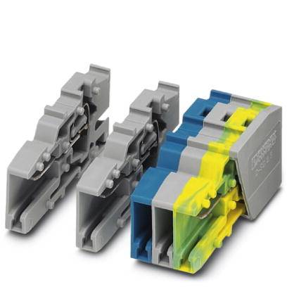 Tri sive plastične stezaljke, svaka s jednim plavim, žutim i zelenim elementom za spajanje električnih vodova.