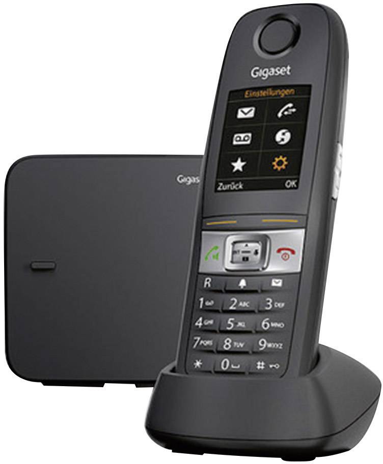 Bežični telefon Gigaset s baznom stanicom. Display prikazuje izborničke simbole. Tipke i zvučnik su prepoznatljivi. Neutralna pozadina.